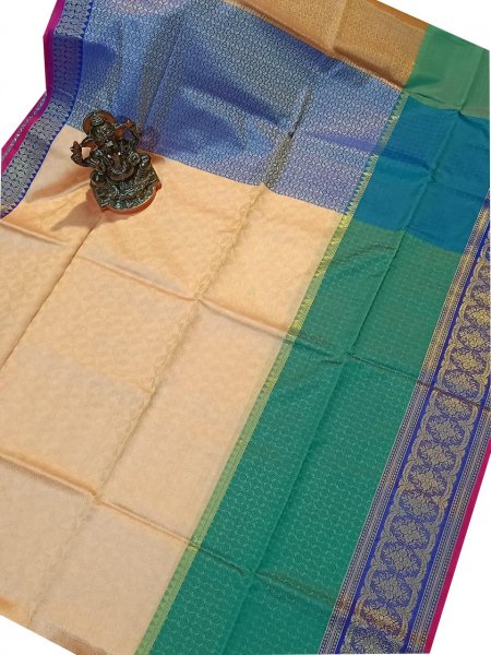 Cream, green and baby blue kora silk saree with kuppatam border